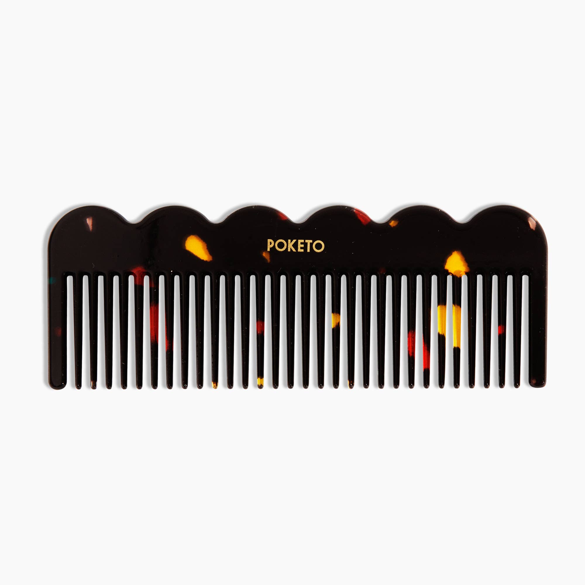 Wave Comb in Black Amber