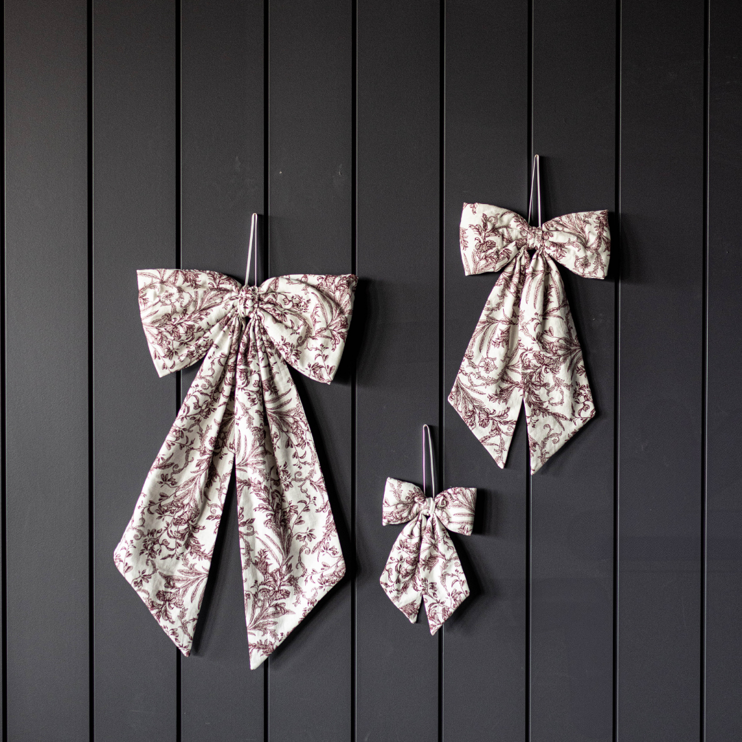 Bows Star Toile Burgundy Fabric