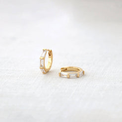 Baguette Huggie Hoop Earrings in gold vermeil on linen