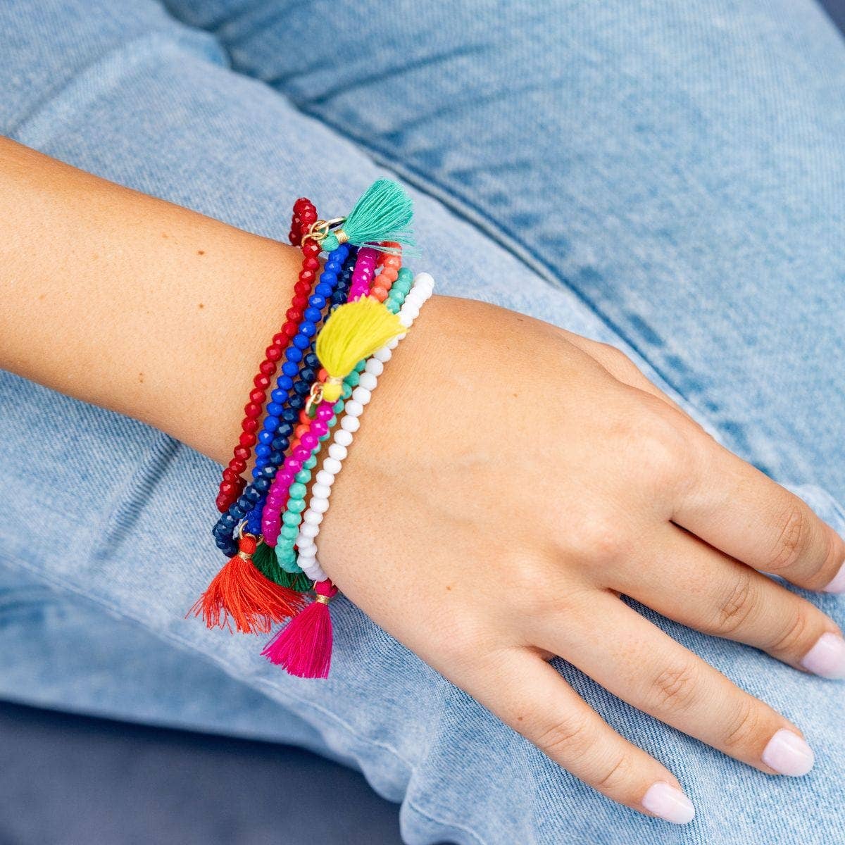 Patsy Solid Crystal Stretch Bracelet With Tassel Coral Wholesale