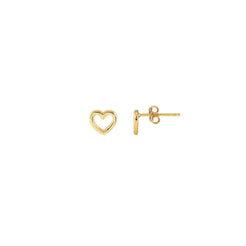 Small gold open heart stud worn on the earlobe