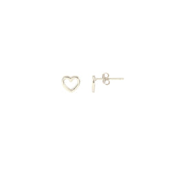 Gold heart stud beside a hoop in an ear stack