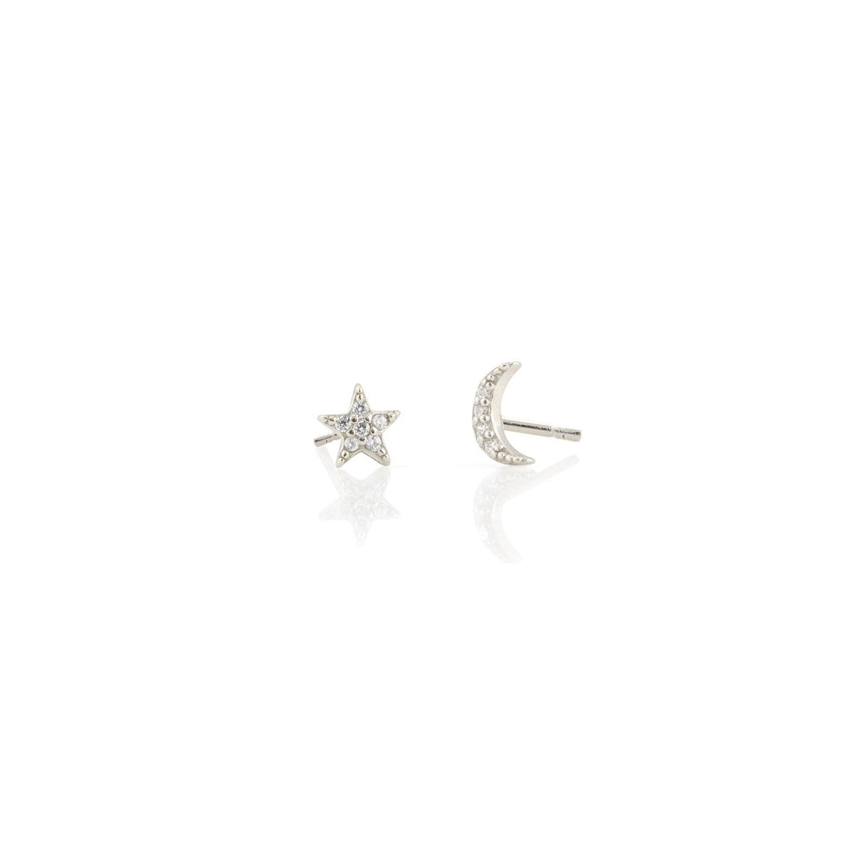 Mismatched star and crescent studs laid flat