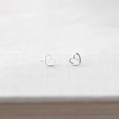 Pair of tiny open hearts shown from the front