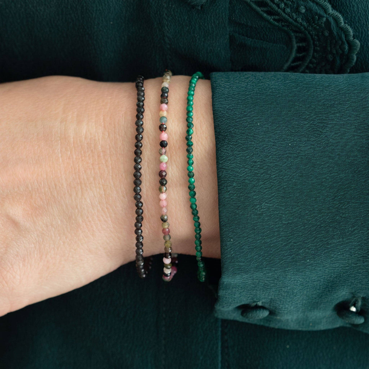 Petite Gemstone Beaded Bracelet styles worn together on a wrist
