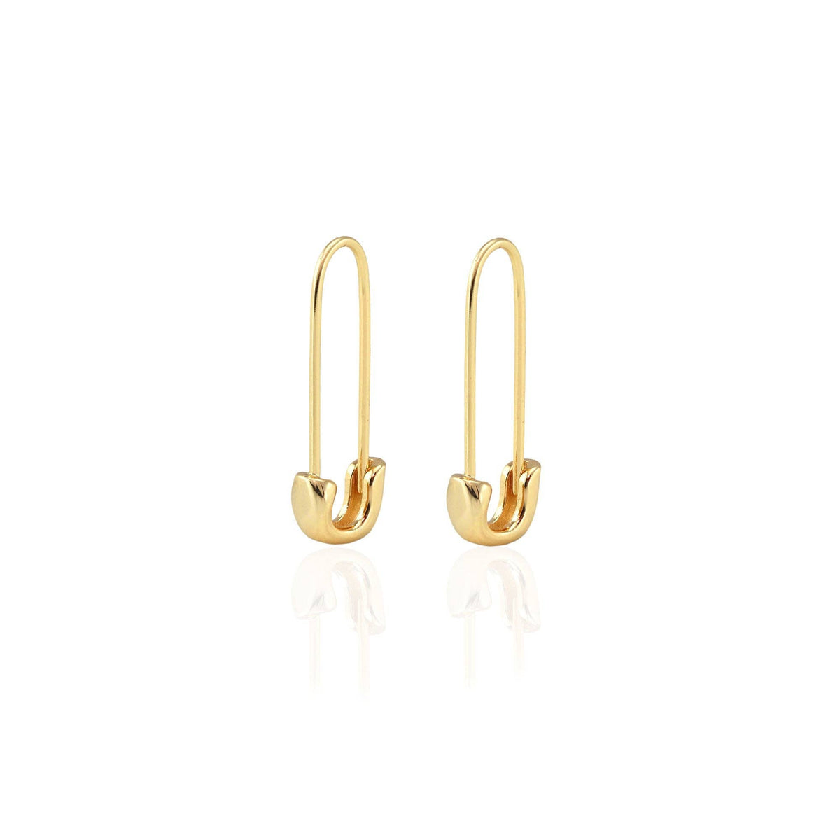 Gold vermeil safety pin hoop on a plain background