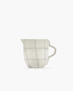 Serax Zuma porcelain milk jug with a hand-stamped geometric pattern